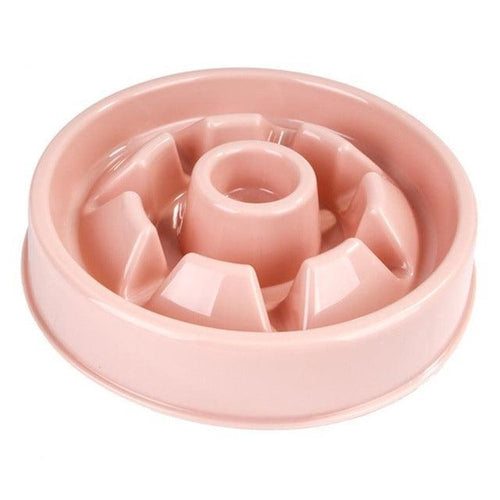 Pink pet slow feeder bowl on a white background